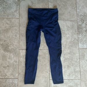 Fabletics cropped legging with pockets and mesh panels.